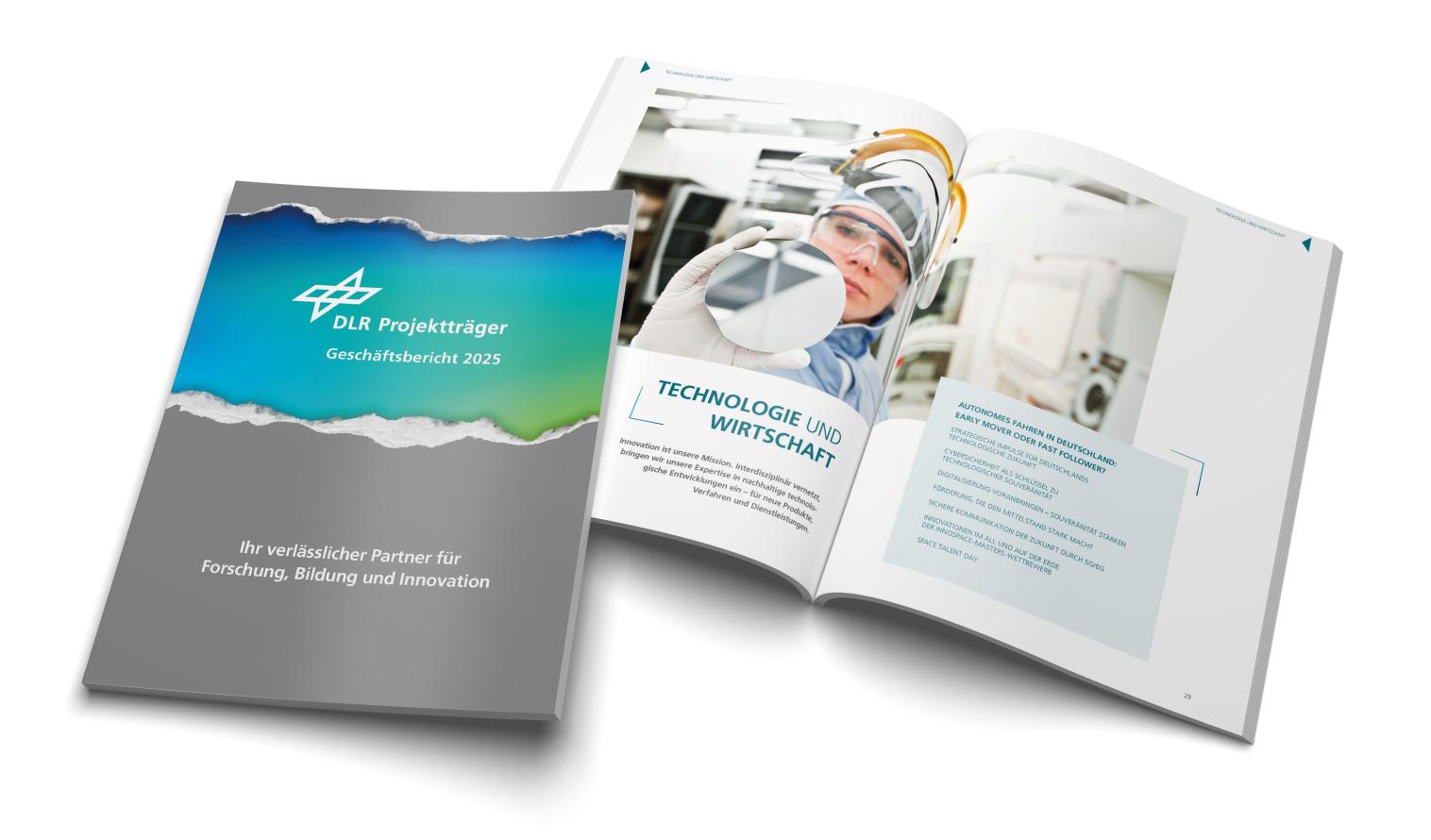 Aufgeschlagener Geschäftsbericht 2025 des DLR Projektträgers. Zu sehen ist das Kapitel über Technologie und Wirtschaft