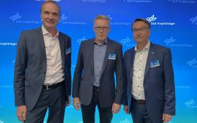 DLR Projektträger Geschäftsleitung und  Christopher Baum